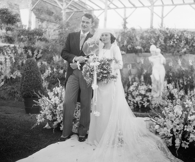 John Wayne and Josephine Saenz | Getty Images Photo by Bettmann