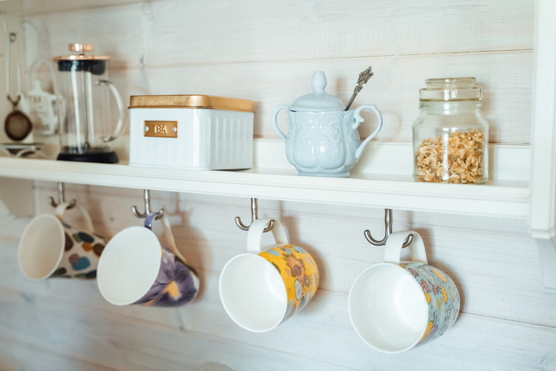 Hooks Under Shelving | Shutterstock Photo by Ira Lichi