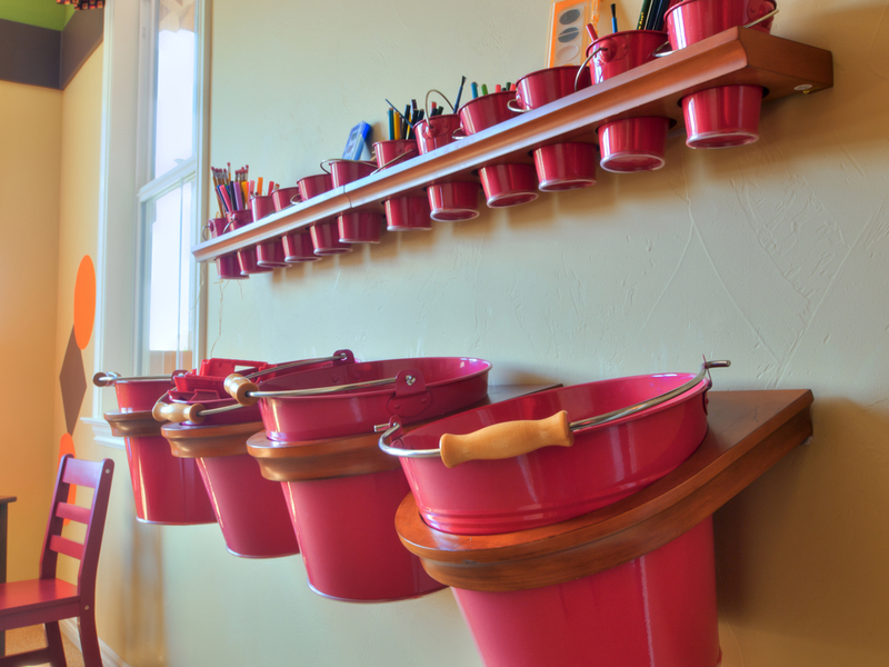 Bucket Storage Rack | Shutterstock Photo by Arina P Habich