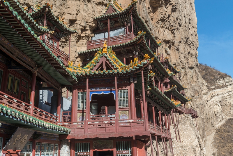 Hanging Out at a Temple | Alamy Stock Photo by Lou Linwei