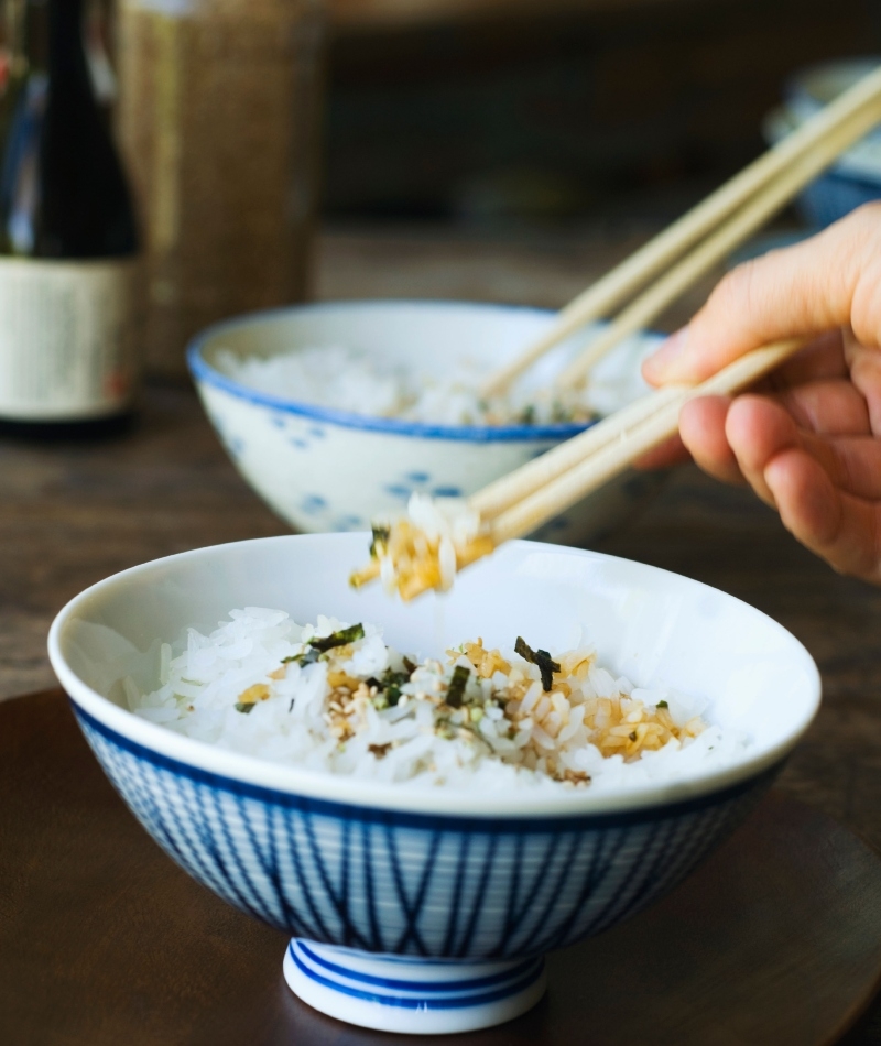 Proper Chopstick Etiquette | Alamy Stock Photo by Tetra Images, LLC/Karin Dreyer